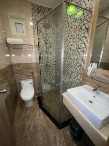 Koupelna v ubytování Pinus Hotel