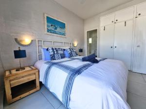 Кровать или кровати в номере Santorini 19 Thira