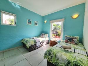 מיטה או מיטות בחדר ב-Santorini 19 Thira