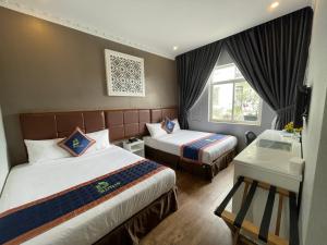 Postel nebo postele na pokoji v ubytování Pinus Hotel