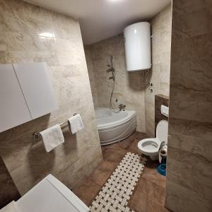 Et badeværelse på Luks apartment