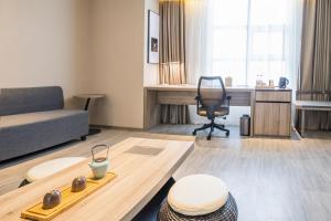 Ruang duduk di Atour Hotel Weifang Jinma Road City Hall
