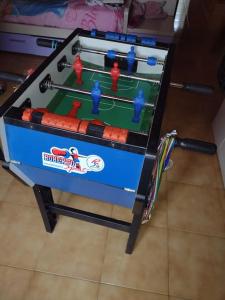a table with a video game on top of it at Bed'n Fast... Always ready. Appartamento in Altare +7 photos