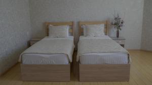 Voodi või voodid majutusasutuse Inga Hotel Yerevan toas