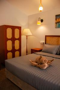Letto o letti in una camera di COCO CABANA