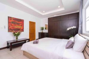 Postel nebo postele na pokoji v ubytování 1 bedroom apartment in Nai Harn