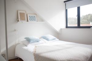 Postel nebo postele na pokoji v ubytování Tureluur - Boulevard de Wielingen 13b - Cadzand-Bad