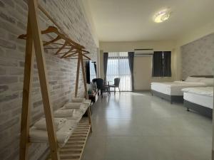 Postel nebo postele na pokoji v ubytování Suixiang B&B
