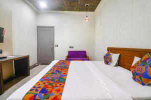 Postel nebo postele na pokoji v ubytování Hotel Be Happy
