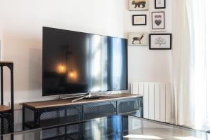 En TV eller et underholdningssystem på Suite Avalanch