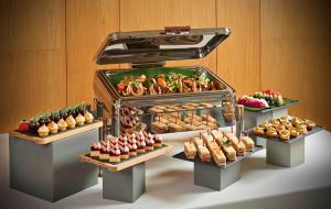 a display of different types of food on a table at The Westin Desaru Coast Resort in Desaru