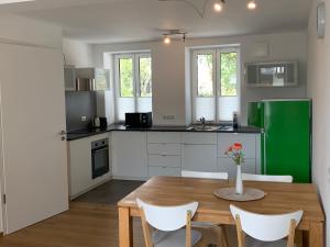Kuchyň nebo kuchyňský kout v ubytování Frundsberg-Apartment