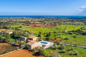 an aerial view of a estate with a swimming pool at Villa S`Alzina by Slow Villas in Santanyi