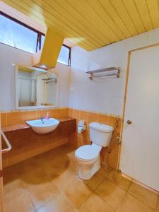 a bathroom with a toilet and a sink at Fahrenheit Pavillion Bukit Bintang By JS-Home in Kuala Lumpur