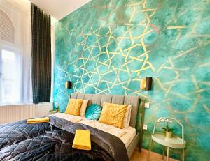 a bedroom with a fish mural on the wall at Luxory Design Apartment#Bakáts#FreeParking#8ppl in Budapest