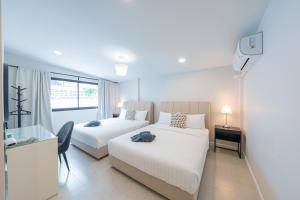 Katil atau katil-katil dalam bilik di The 38 Pool Villas Pattaya