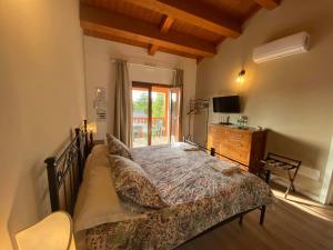Postel nebo postele na pokoji v ubytování Albergo Diffuso Borgo Retrosi di Amatrice