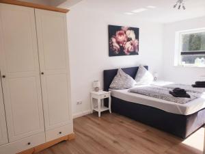 Ένα ή περισσότερα κρεβάτια σε δωμάτιο στο Haus Björn, nahe Büsum - 6km
