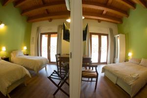 Postel nebo postele na pokoji v ubytování Albergo Diffuso Borgo Retrosi di Amatrice
