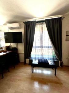 Telewizja i/lub zestaw kina domowego w obiekcie Apartment PM