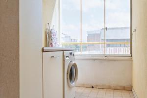 a washing machine in a room with a window at Casa Mabel Terrace - Lecce Selection in Lecce