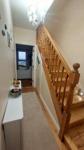 a staircase in a room with a stair case at Private Double Bedroom in front of the Galway Port - Guest House in Galway
