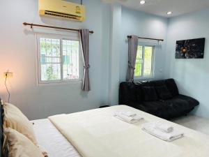 Xaiyong Resort - ไทรโยงรีสอร์ท客房内的一张或多张床位