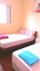 Ubatuba Wild Surf Hostel客房内的一张或多张床位
