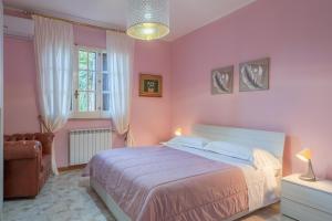 Posteľ alebo postele v izbe v ubytovaní Villa Angela