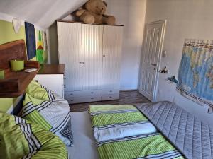 Postel nebo postele na pokoji v ubytování Ferienhaus Tüchler + 33 fotografií