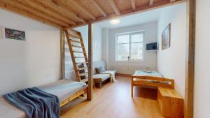Televízia a/alebo spoločenská miestnosť v ubytovaní Apartmán Topolová 912B