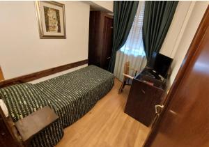 Кровать или кровати в номере Hotel Giò Wine e Jazz Area