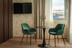 TV a/nebo společenská místnost v ubytování Hotel Tatra