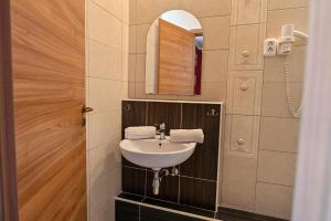 Kúpeľňa v ubytovaní BellaVista 2 Apartman