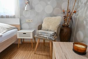 Posteľ alebo postele v izbe v ubytovaní BellaVista 2 Apartman
