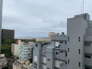an aerial view of a city with buildings at Loft completo, Centro Historico 706 in Porto Alegre