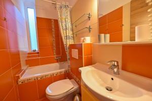 Kúpeľňa v ubytovaní BellaVista 2 Apartman