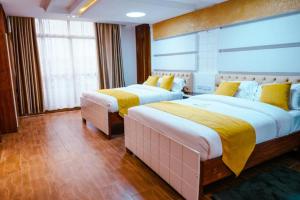 Ένα ή περισσότερα κρεβάτια σε δωμάτιο στο Barre Hotel