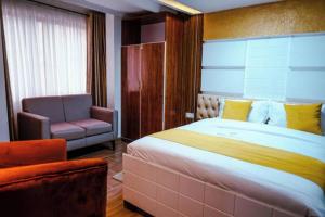 Katil atau katil-katil dalam bilik di Barre Hotel