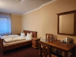 Postel nebo postele na pokoji v ubytování Mamma Mia - pokoje gościnne