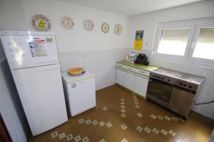 Kuchyň nebo kuchyňský kout v ubytování Holiday House Jasna
