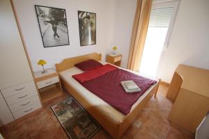 Postel nebo postele na pokoji v ubytování Holiday House Jasna