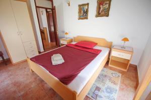 Postel nebo postele na pokoji v ubytování Holiday House Jasna