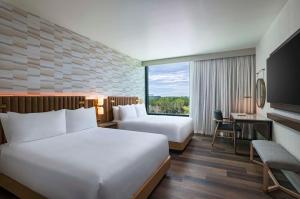 Voodi või voodid majutusasutuse Hyatt Regency Conroe toas