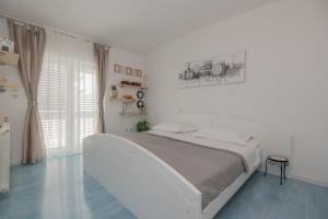 Posteľ alebo postele v izbe v ubytovaní Villa Piljak