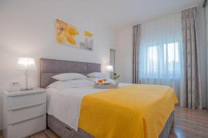 Posteľ alebo postele v izbe v ubytovaní Villa Piljak