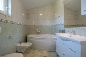 Kúpeľňa v ubytovaní Villa Piljak