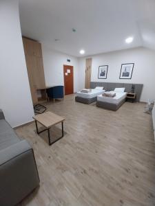 Voodi või voodid majutusasutuse Konačište Almex in toas