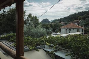 a view of a vegetable garden from a balcony at Acropolis Mystra Guesthouse in Mystras