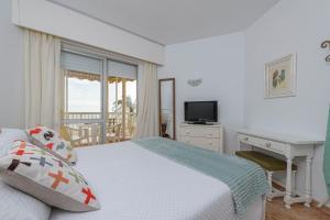 Ένα ή περισσότερα κρεβάτια σε δωμάτιο στο Great Location and Frontal Sea View Fuengirola